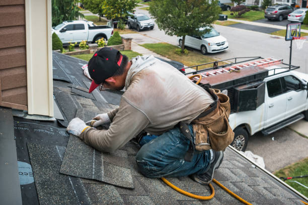 Professional Storm Damage Roof Repair technician working in Lake Lure, NC